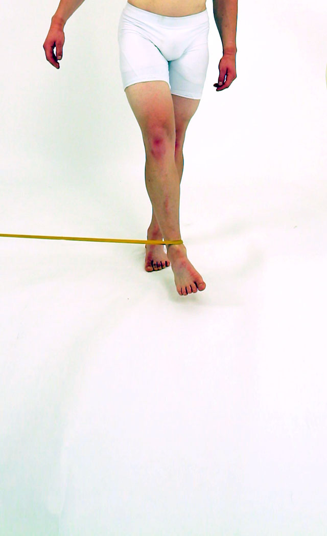 Hip adduction - forward cross with bands